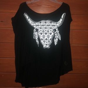 Black shirt, white cow